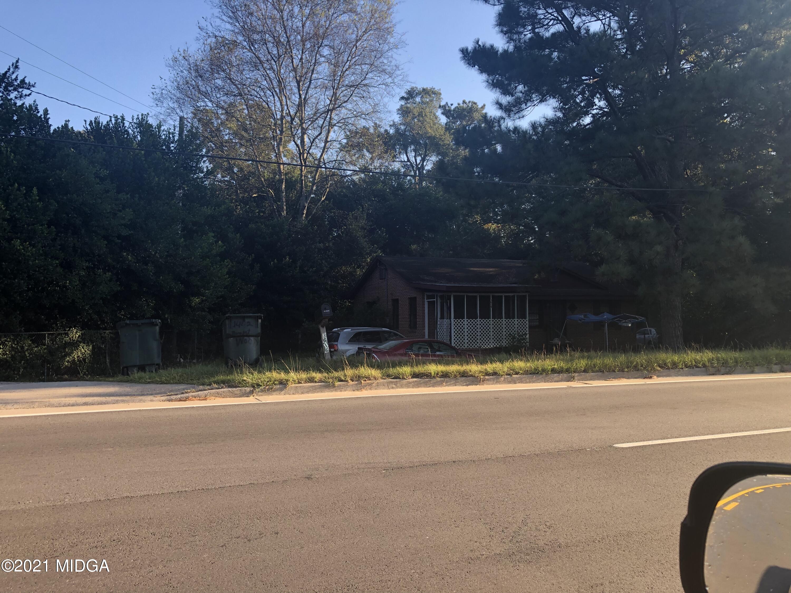 a view of street along with trees