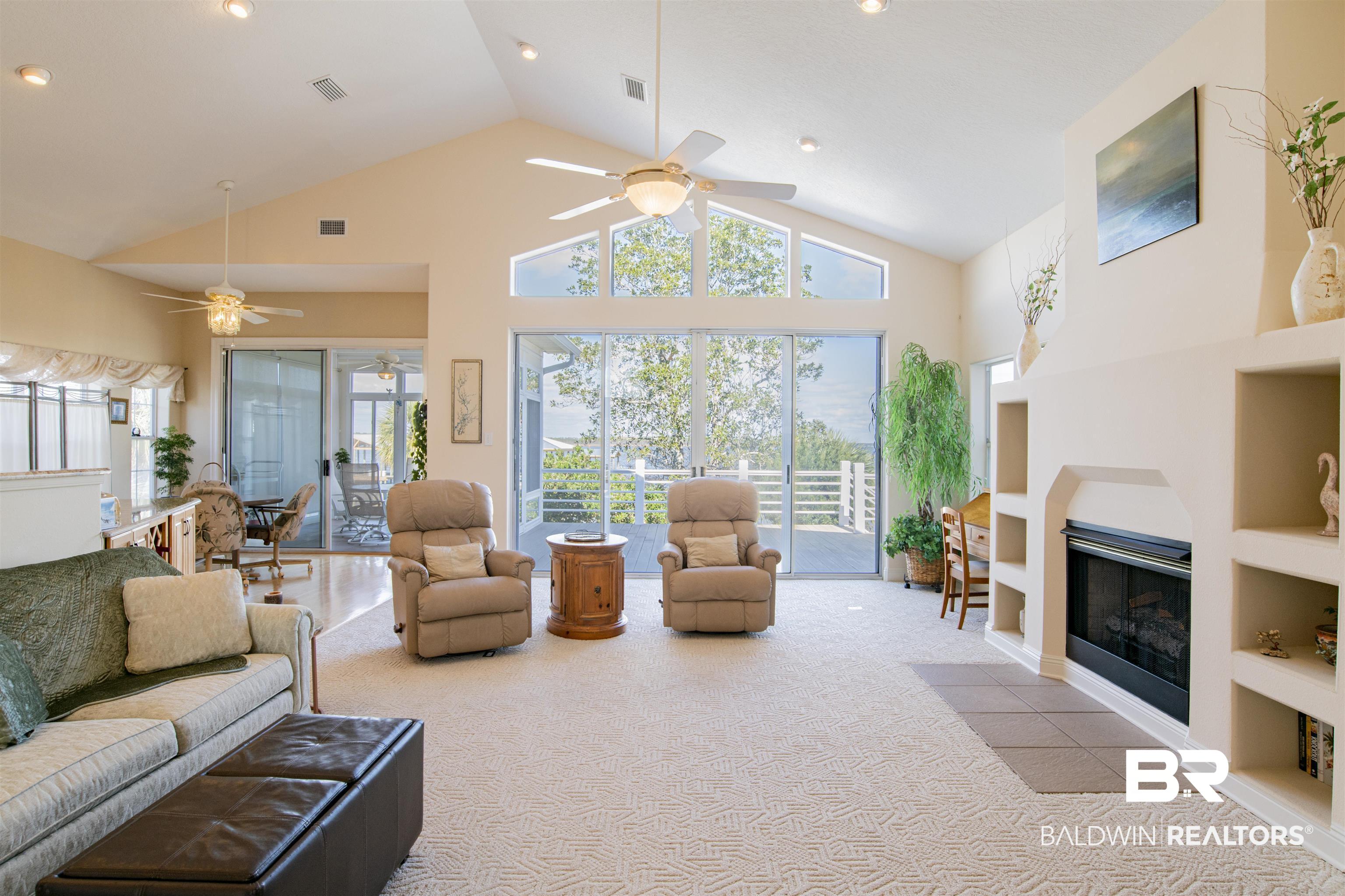 24615 Gulf Bay Road Orange Beach, AL 36561 - Photo 5 of 47 SLIDING DOOR LEADS TO LARGE WATERFRONT DECK