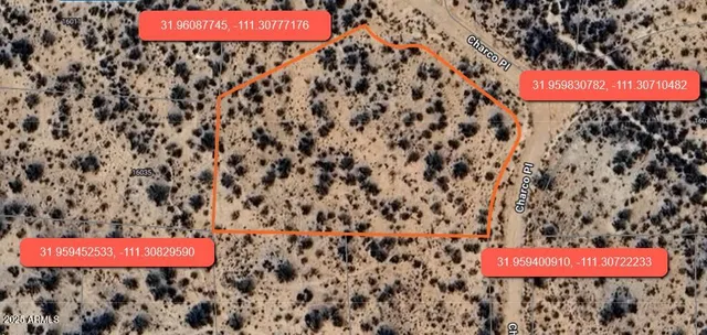 view of a brick wall with an outdoor space