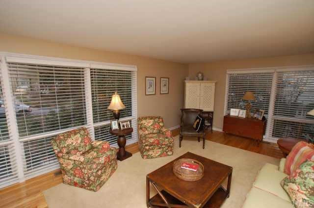 3427 Redbud Lane Raleigh, NC 27607 - Photo 7 of 12 Large picture windows fill the living room with natural light Other