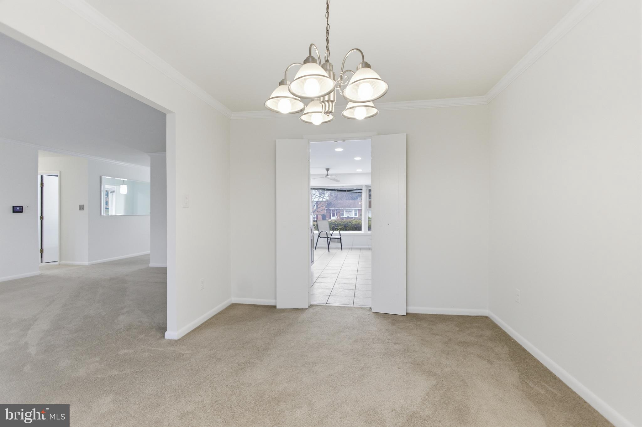 14717 Flintstone Lane Silver Spring, MD 20905 - Photo 22 of 32 a view of an empty room and window