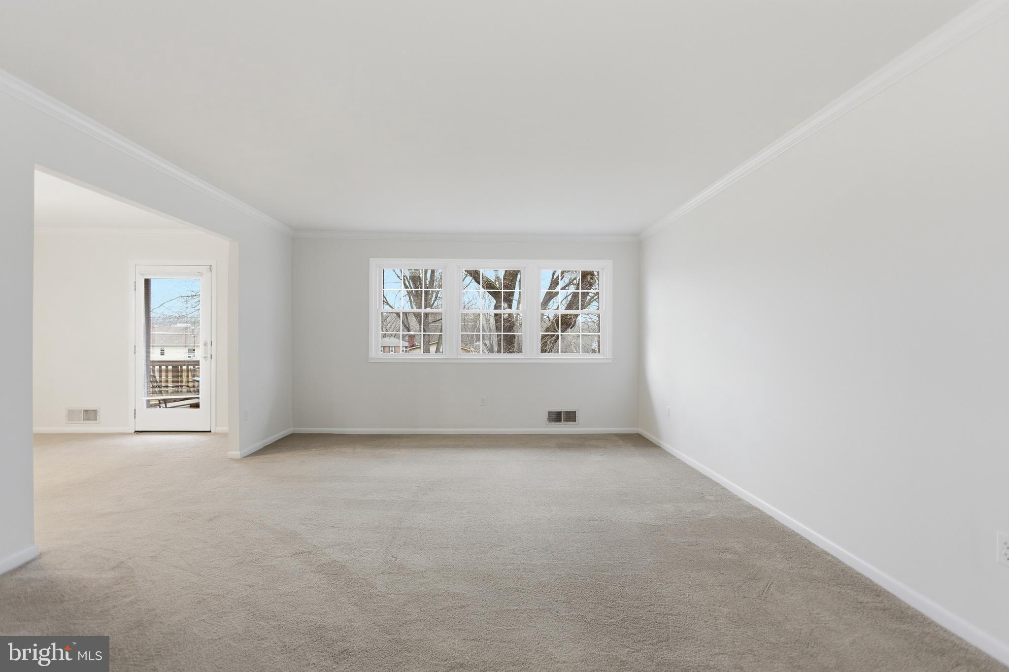 14717 Flintstone Lane Silver Spring, MD 20905 - Photo 24 of 32 an empty room with windows
