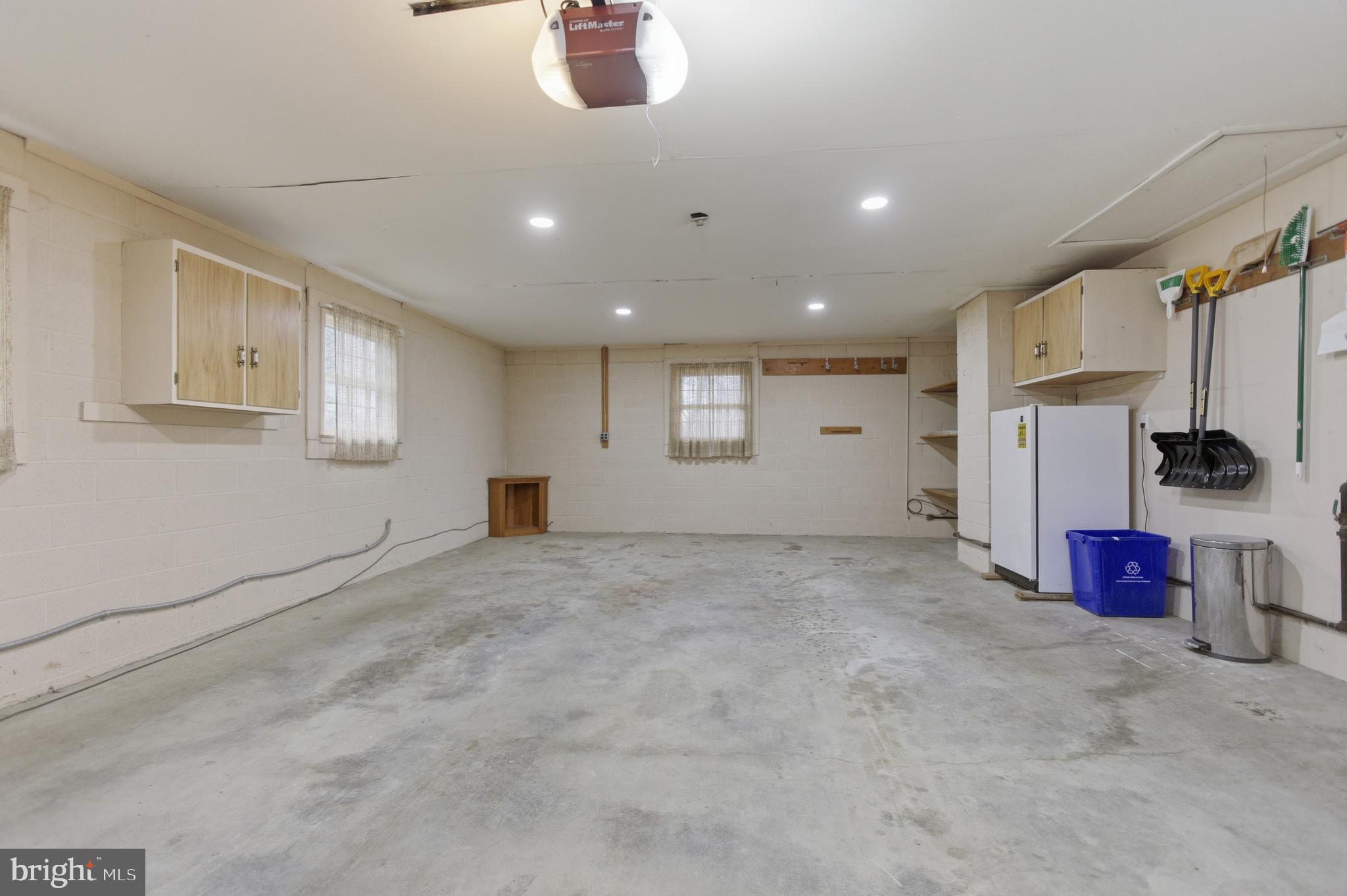 14717 Flintstone Lane Silver Spring, MD 20905 - Photo 30 of 32 a view of a kitchen with a sink and cabinets