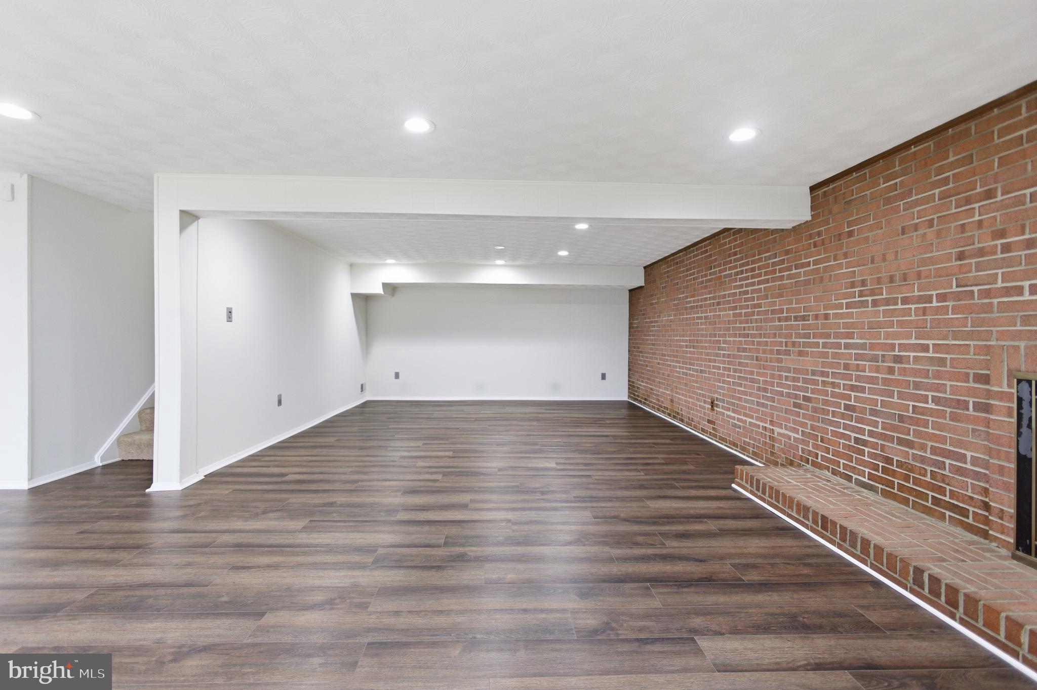 14717 Flintstone Lane Silver Spring, MD 20905 - Photo 5 of 32 a view of a room with wooden floor