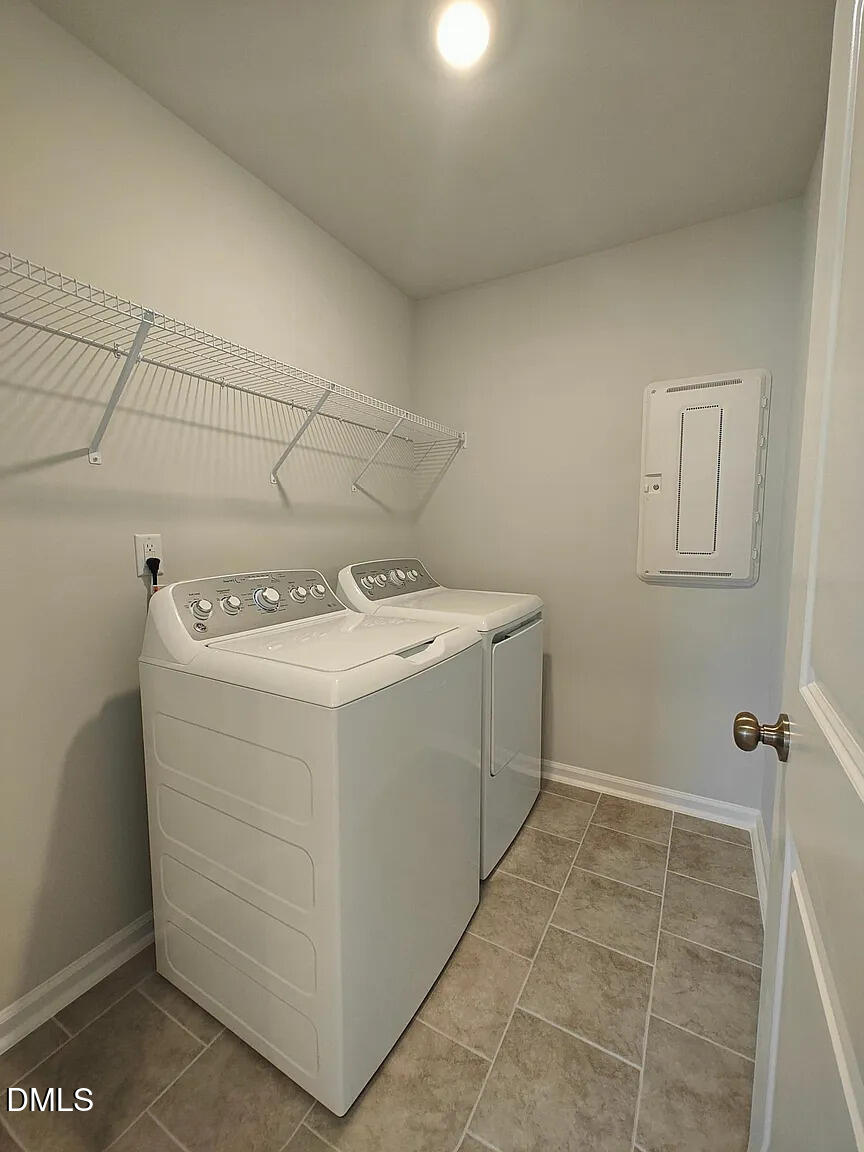 1039 Red Wing Drive Durham, NC 27703 - Photo 17 of 40 a utility room with dryer and washer
