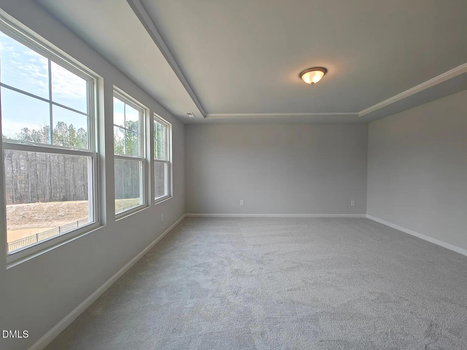 1039 Red Wing Drive Durham, NC 27703 - Photo 18 of 40 an empty room with a empty space and windows