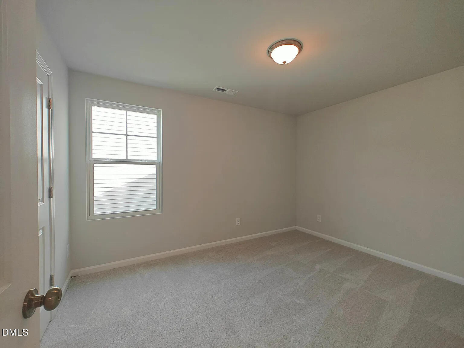 1039 Red Wing Drive Durham, NC 27703 - Photo 25 of 40 an empty room with a window