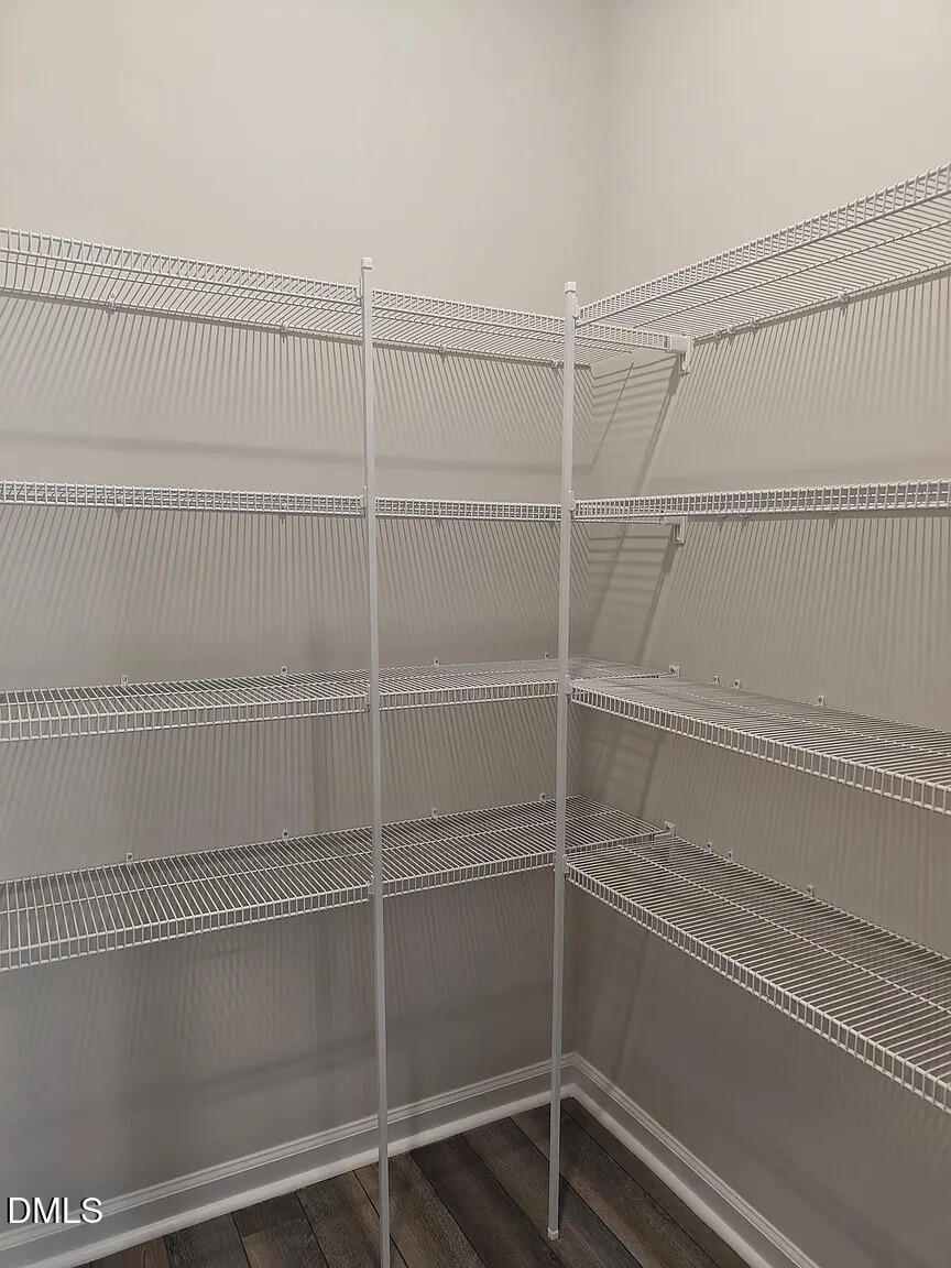 1039 Red Wing Drive Durham, NC 27703 - Photo 29 of 40 a view of a room with racks on the wall