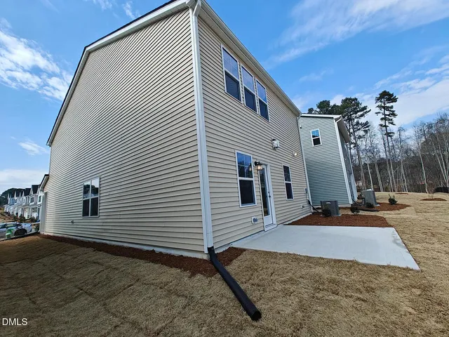 a view of a house with a patio