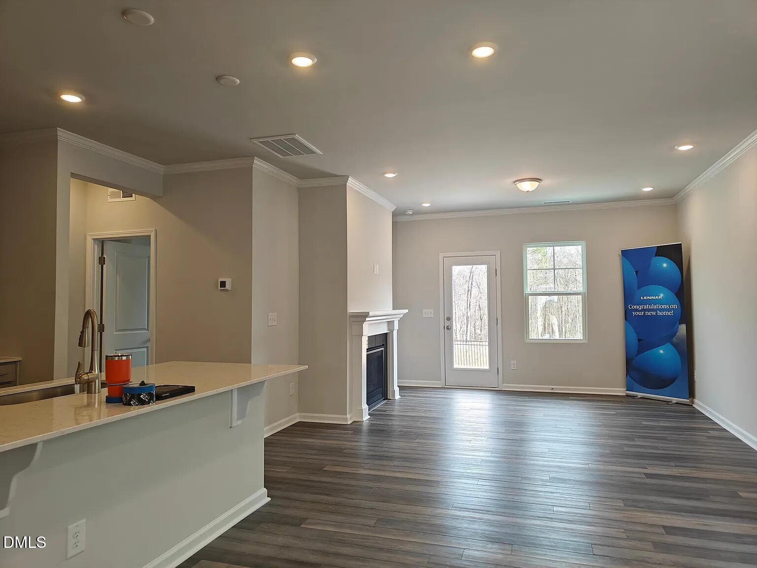 1039 Red Wing Drive Durham, NC 27703 - Photo 5 of 40 a view of an empty room with window and wooden floor