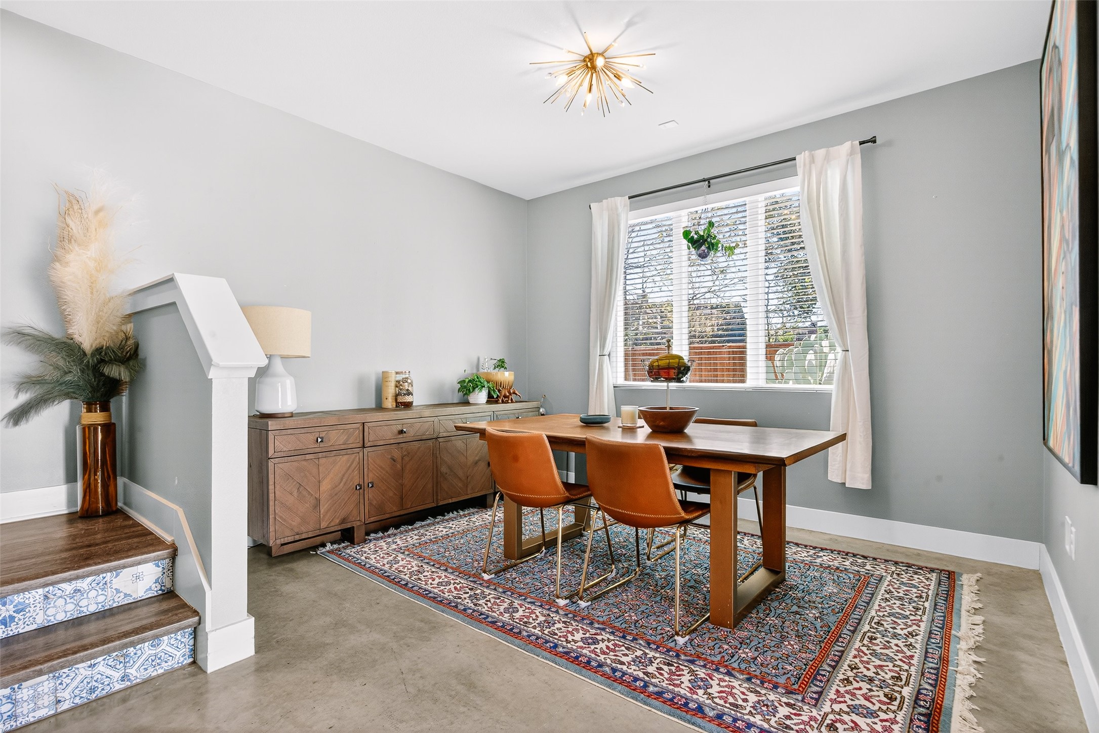4917 Sunset Trail, Unit A Austin, TX 78745 - Photo 13 of 35 Dining space with baseboards and concrete flooring
