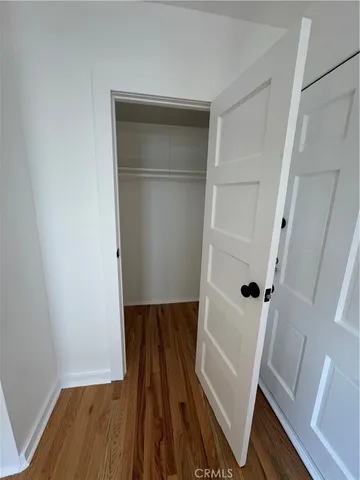 a view of wooden floor in a bathroom