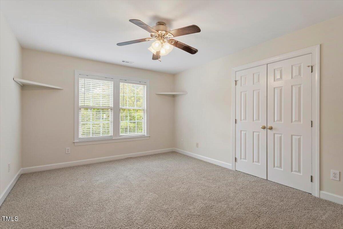1817 Foxbrook Drive Raleigh, NC 27603 - Photo 36 of 61 a view of an empty room with a window
