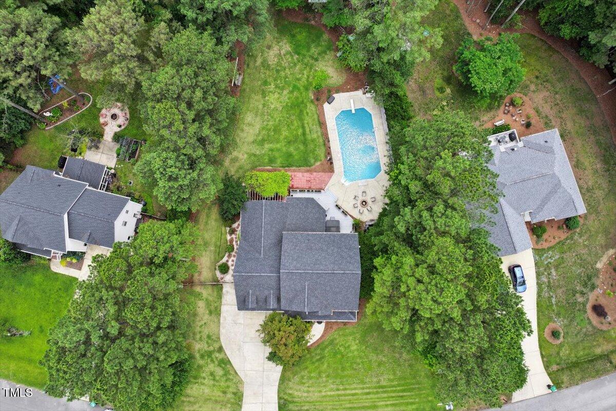 1817 Foxbrook Drive Raleigh, NC 27603 - Photo 55 of 61 an aerial view of a house with outdoor space and a garden