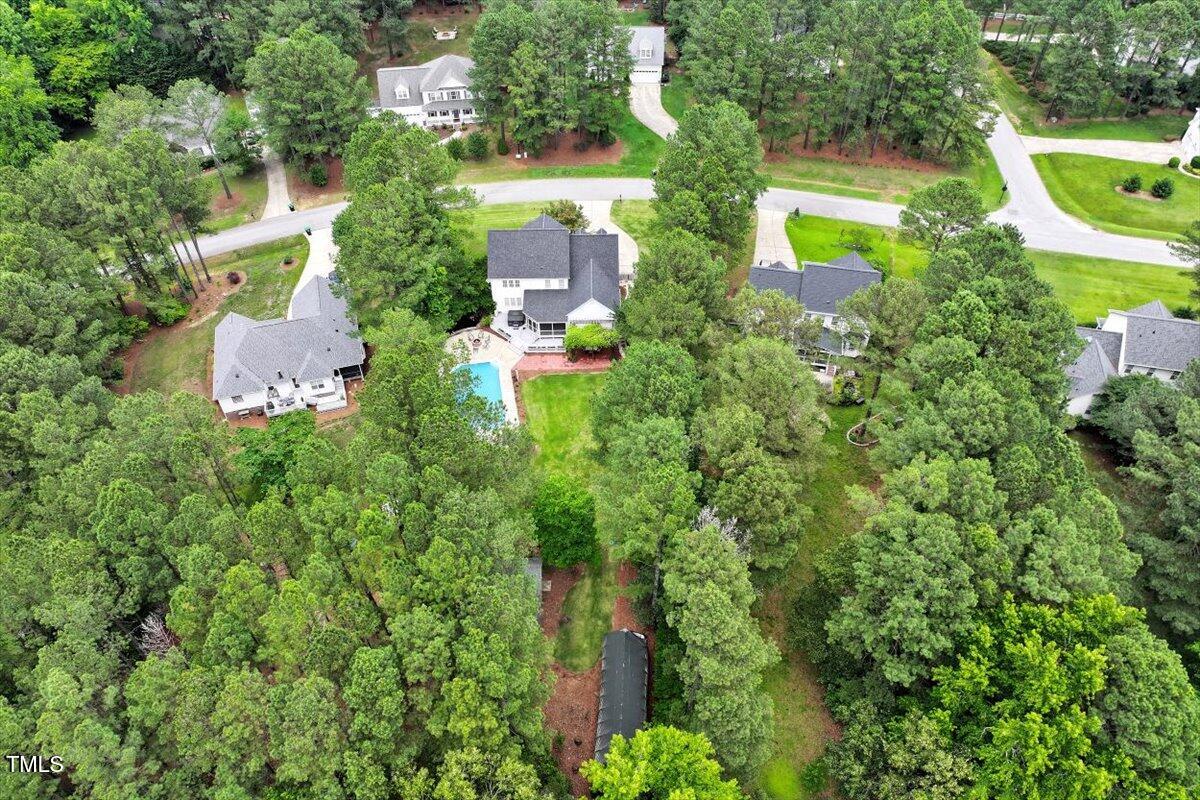 1817 Foxbrook Drive Raleigh, NC 27603 - Photo 60 of 61 an aerial view of a house with a yard and garden