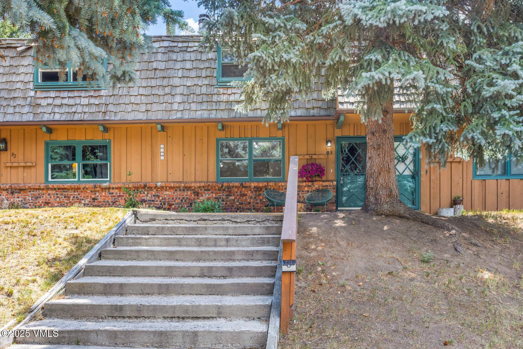 2456 Chamonix Lane, Unit B3 Vail, CO 81657 - Photo 28 of 29 a view of a house with a street