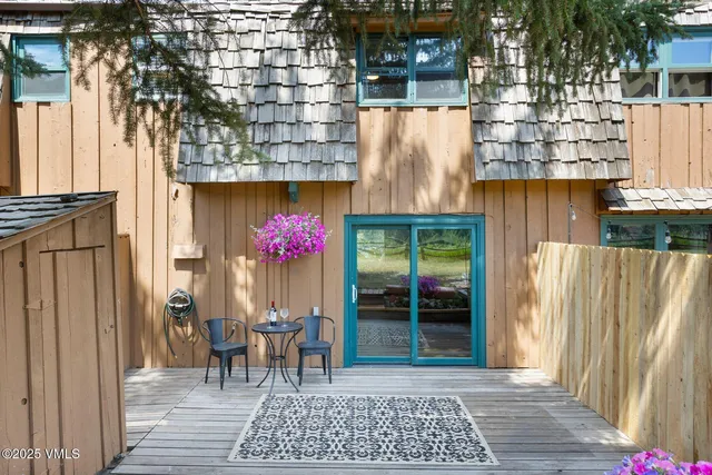 a view of a house with a potted plant
