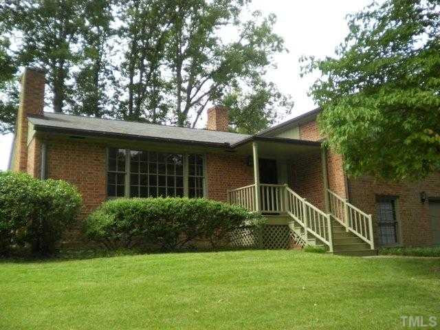 All Brick Split Level Home- Mature dogwood trees grace the entrance and side of the yard... Exterior Front