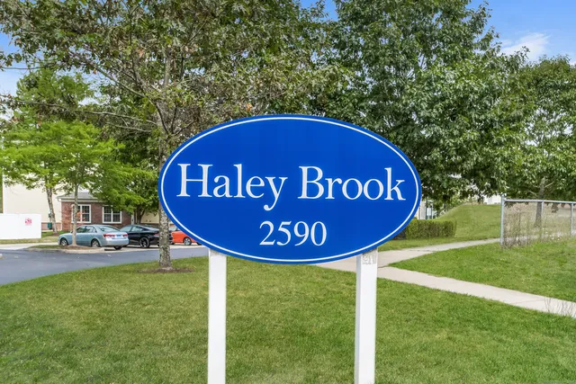 a view of a park with welcome board