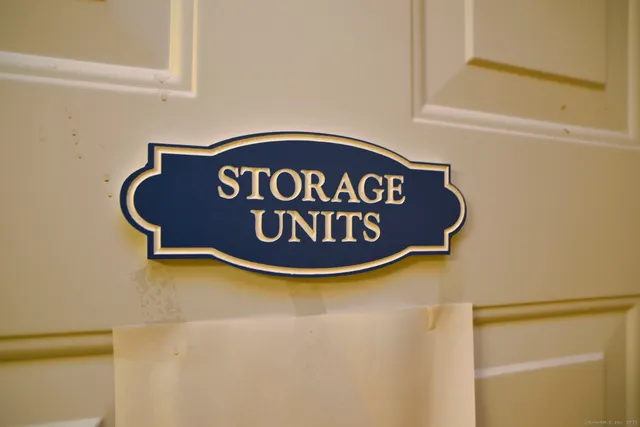 a blue sign that is on the wall