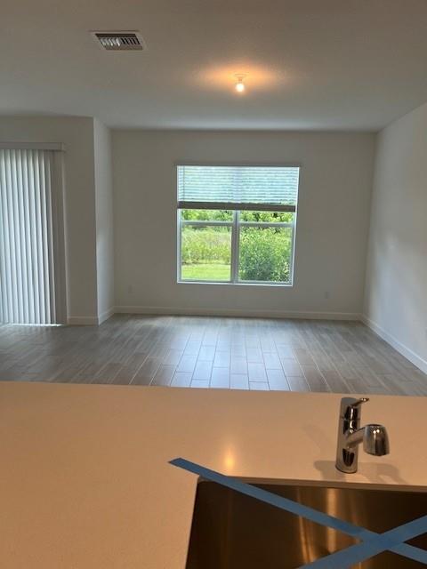 4393 Hammock Grove Drive Lake Worth, FL 33467 - Photo 18 of 32 a view of kitchen and window