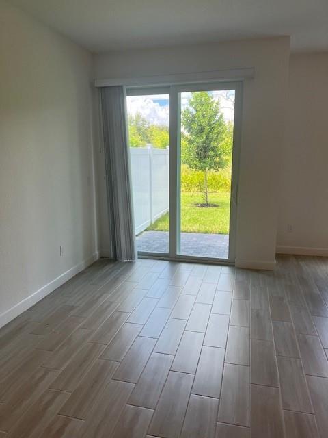 4393 Hammock Grove Drive Lake Worth, FL 33467 - Photo 20 of 32 a view of an empty room with a window