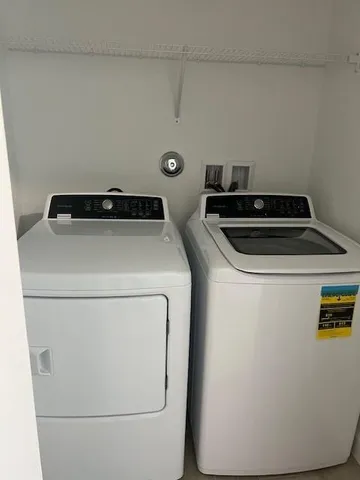 a close up view of washer and dryer
