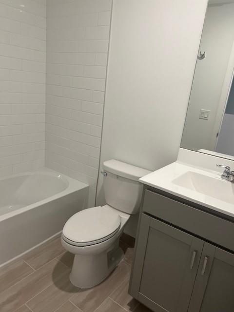 4393 Hammock Grove Drive Lake Worth, FL 33467 - Photo 32 of 32 a white toilet sitting next to a bath tub