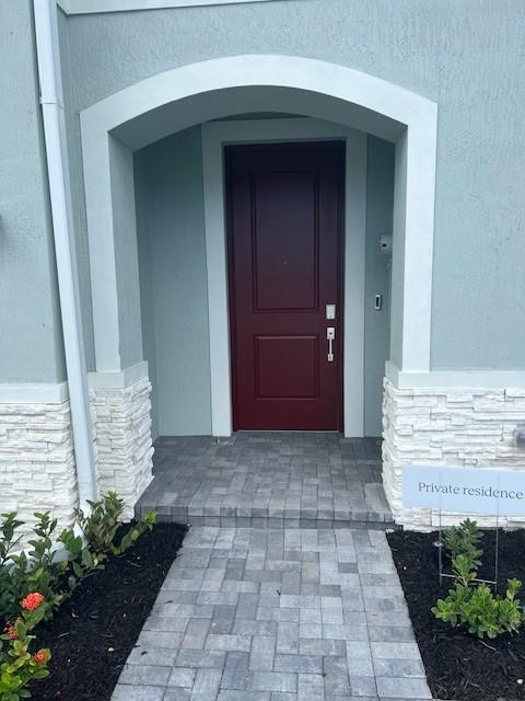 4393 Hammock Grove Drive Lake Worth, FL 33467 - Photo 5 of 32 a view of front door of house