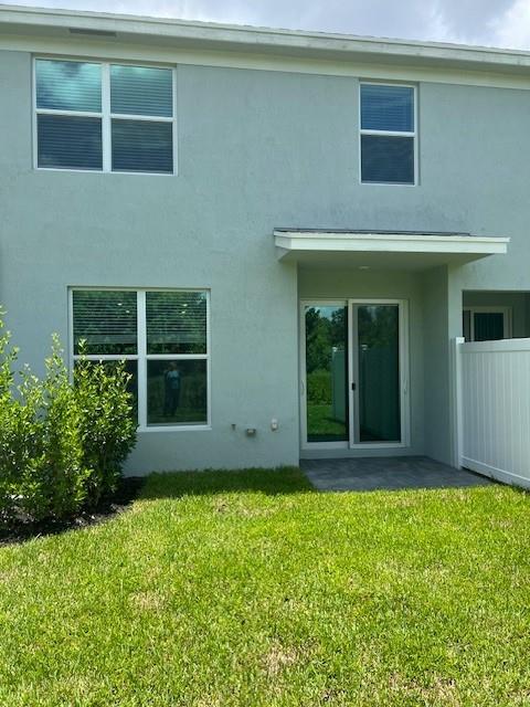 4393 Hammock Grove Drive Lake Worth, FL 33467 - Photo 6 of 32 a view of house with backyard space and porch