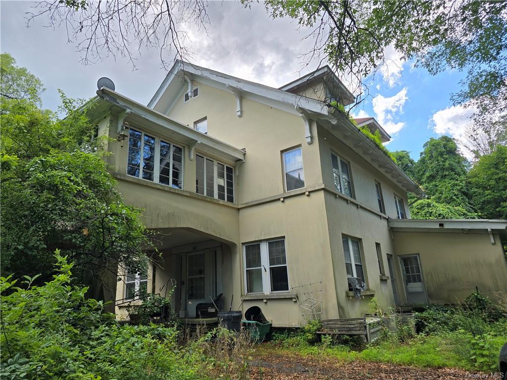 62 Old Glenham Road Fishkill, NY 12524 - Photo 2 of 33 a view of a white building among the street side