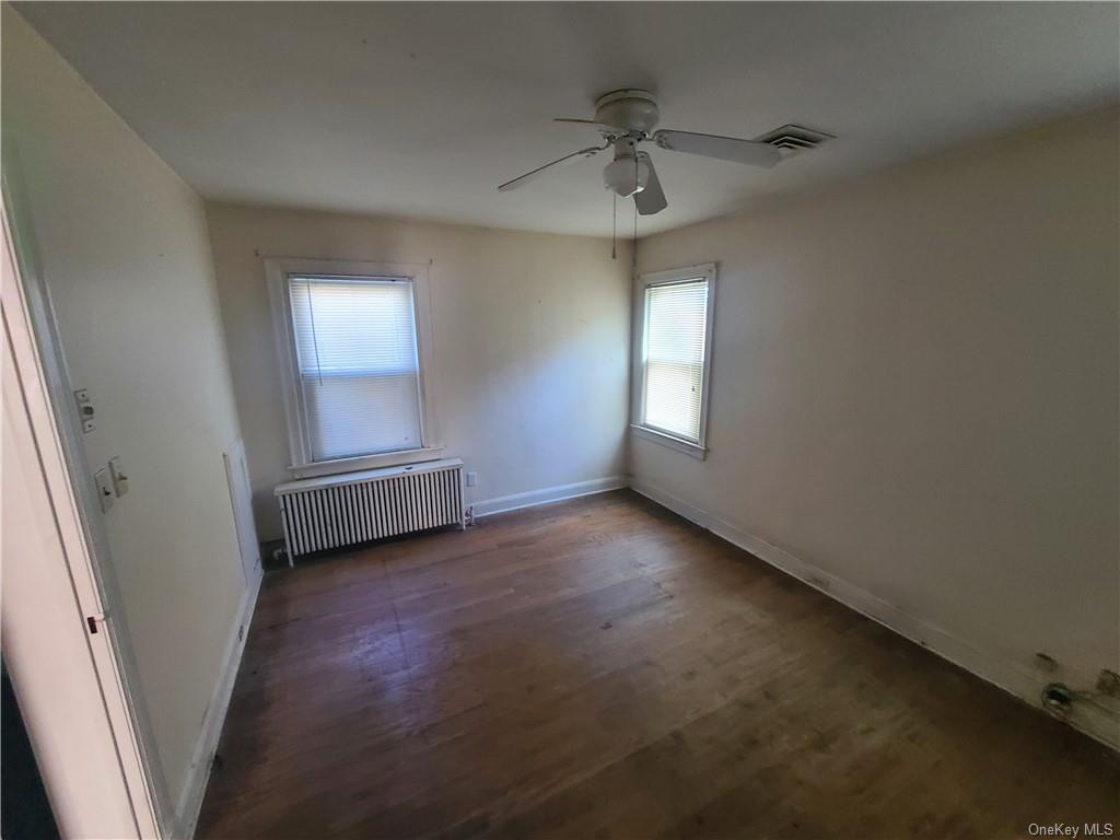 62 Old Glenham Road Fishkill, NY 12524 - Photo 23 of 33 an empty room with windows and fan