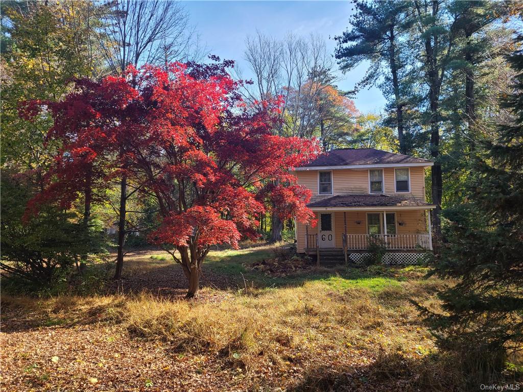 62 Old Glenham Road Fishkill, NY 12524 - Photo 4 of 33 a view of house with yard and sitting area