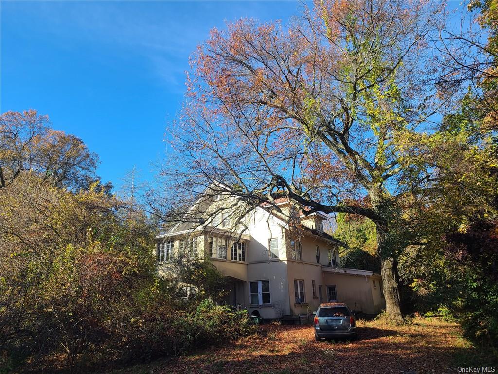 62 Old Glenham Road Fishkill, NY 12524 - Photo 10 of 33 a tree in front of a building