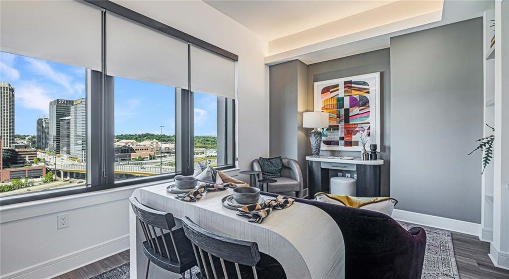 1301 Spring Street Northwest, Unit A3 Atlanta, GA 30309 - Photo 35 of 39 a view of a workspace with furniture and a window