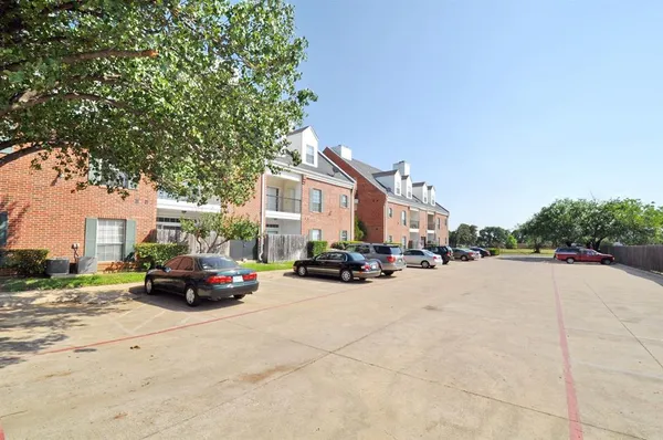 a car parked in front of a house