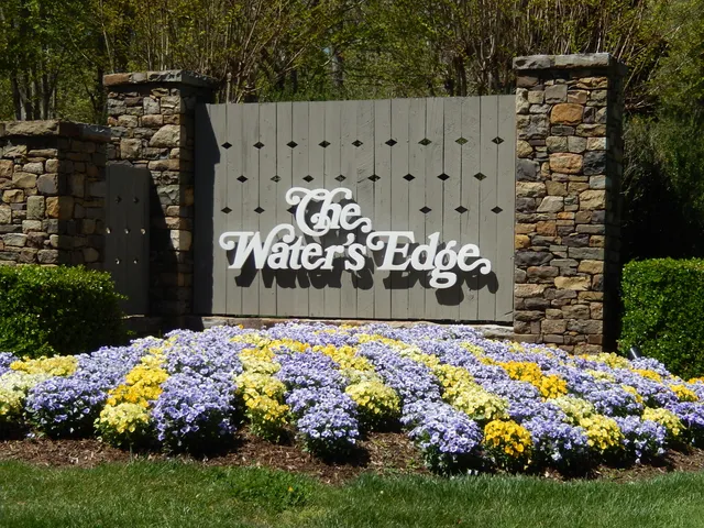 a sign broad on the side of the road