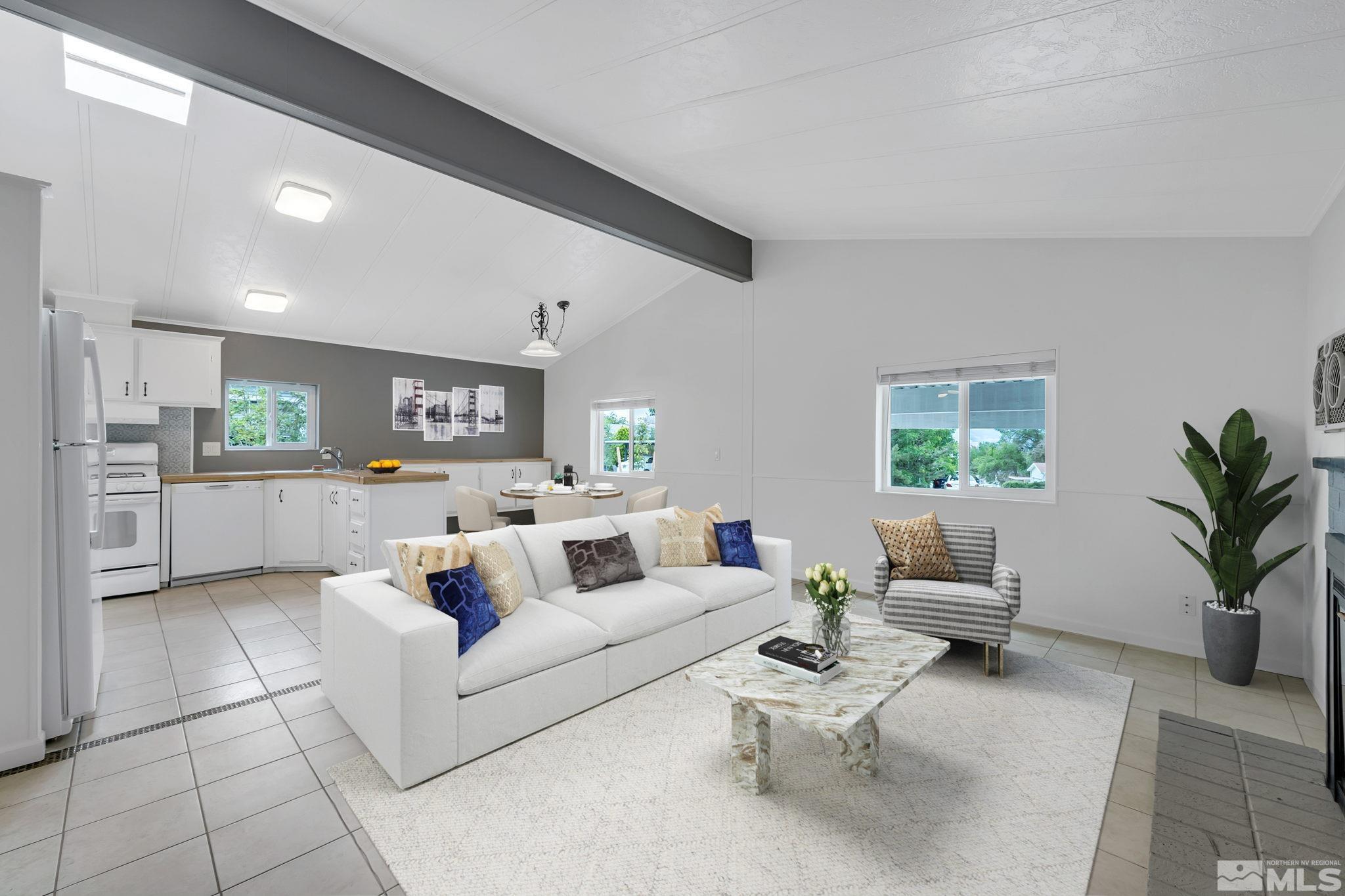 2177 Barberry Way Reno, NV 89512 - Photo 6 of 27 a living room with furniture and a large window
