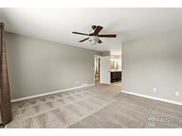 a bathroom with a sink vanity and mirror