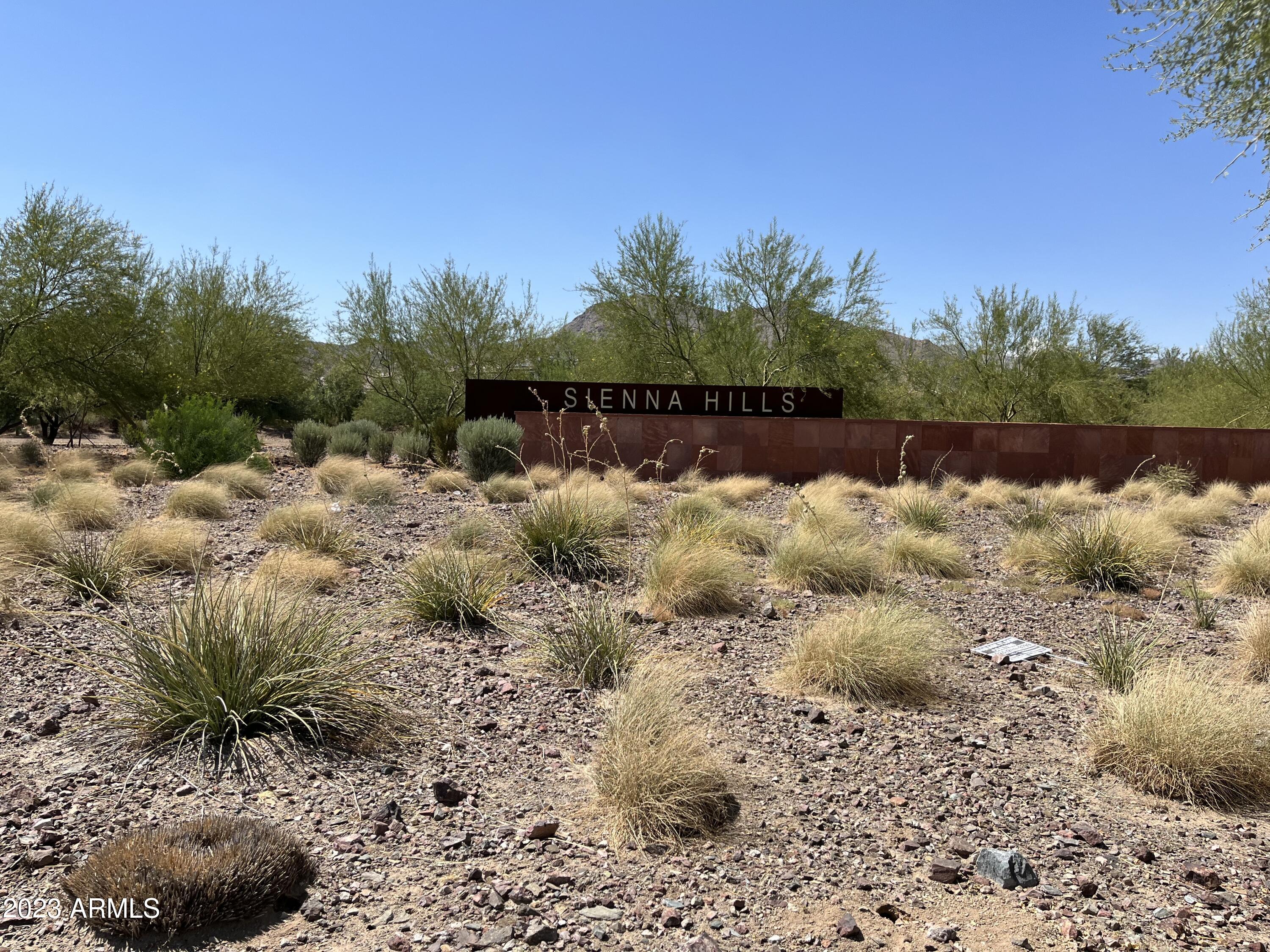 21218 West Granada Road Buckeye, AZ 85396 - Photo 31 of 34 a view of lake with green space