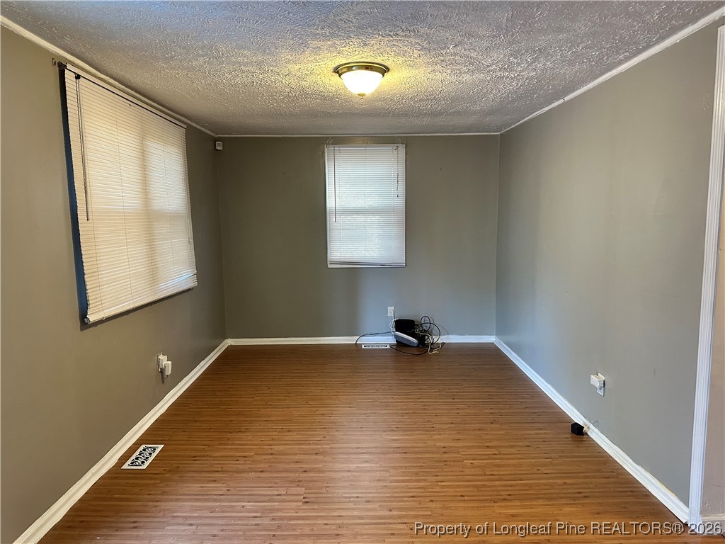 2986 Doc Brown Road Raeford, NC 28376 - Photo 2 of 14 a view of a room with wooden floor and a window