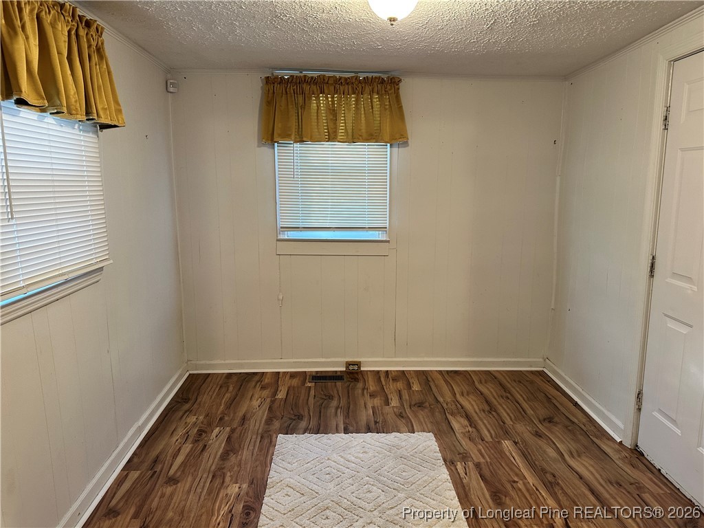 2986 Doc Brown Road Raeford, NC 28376 - Photo 10 of 14 a view of a room with wooden floor and window