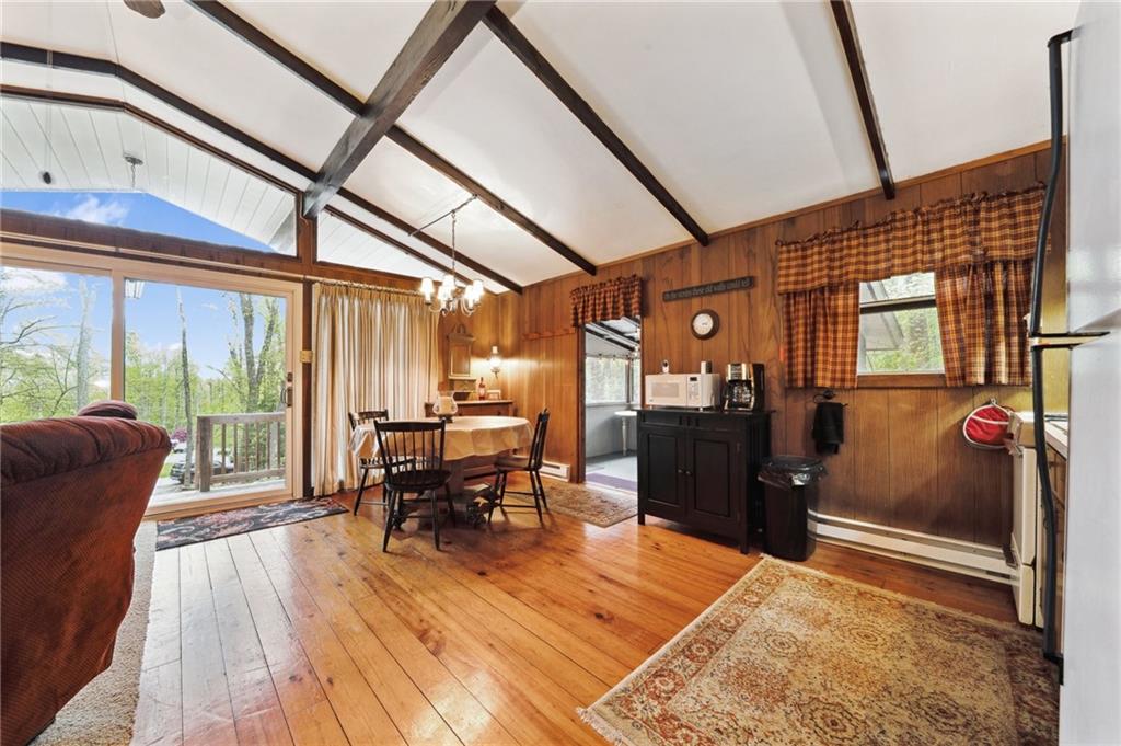 510 Forest Road Acme, PA 15610 - Photo 11 of 30 a living room with furniture a wooden floor and next to a window
