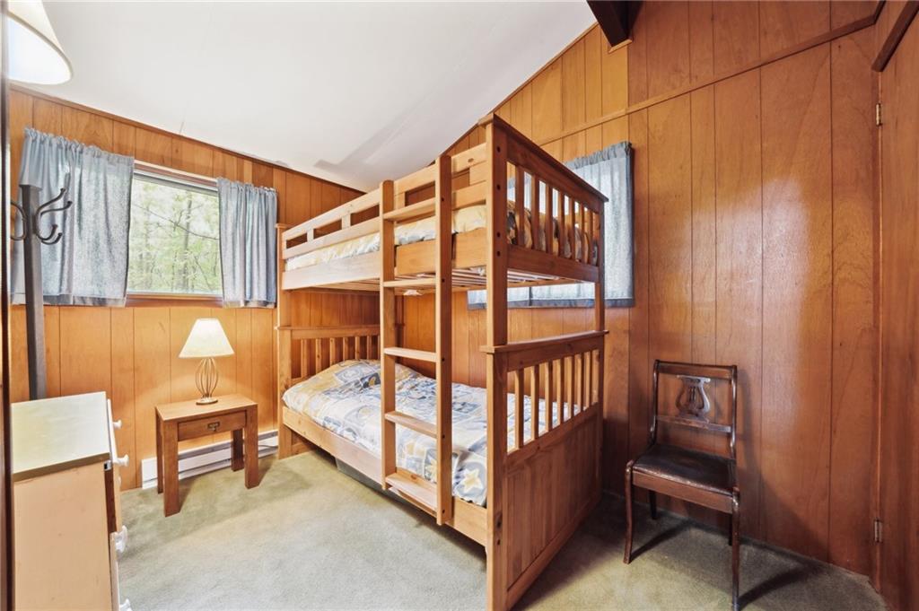 510 Forest Road Acme, PA 15610 - Photo 18 of 30 a bedroom with a bed and a window