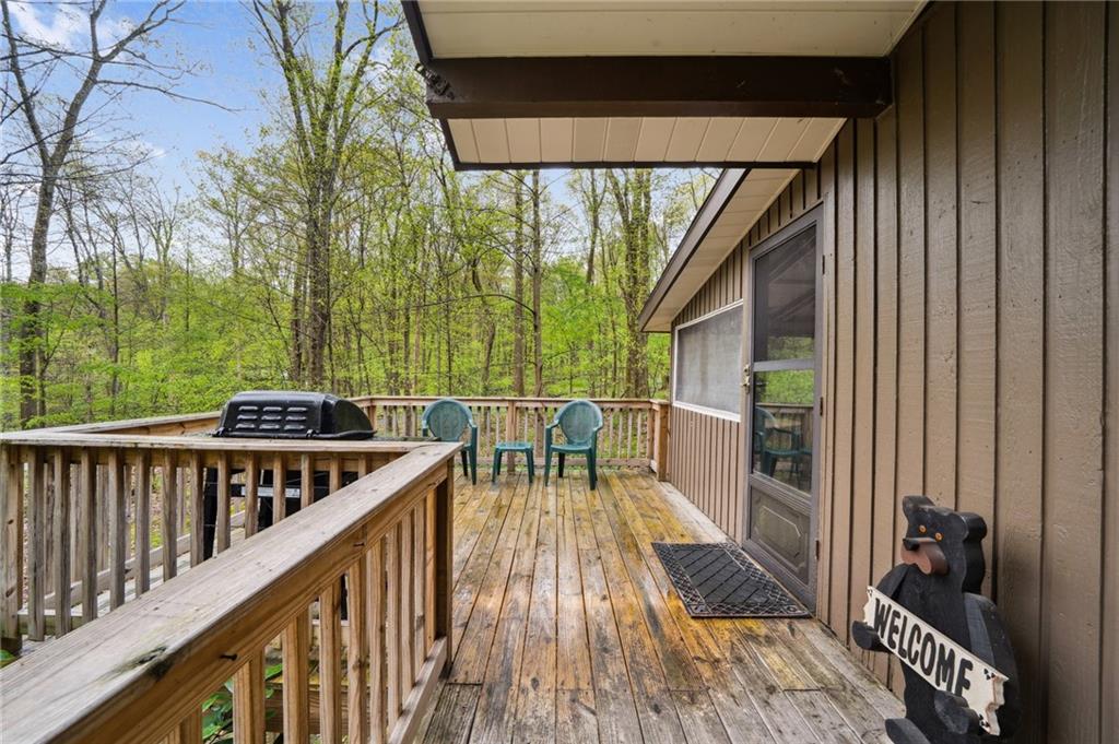 510 Forest Road Acme, PA 15610 - Photo 22 of 30 a view of balcony with wooden floor and outdoor seating
