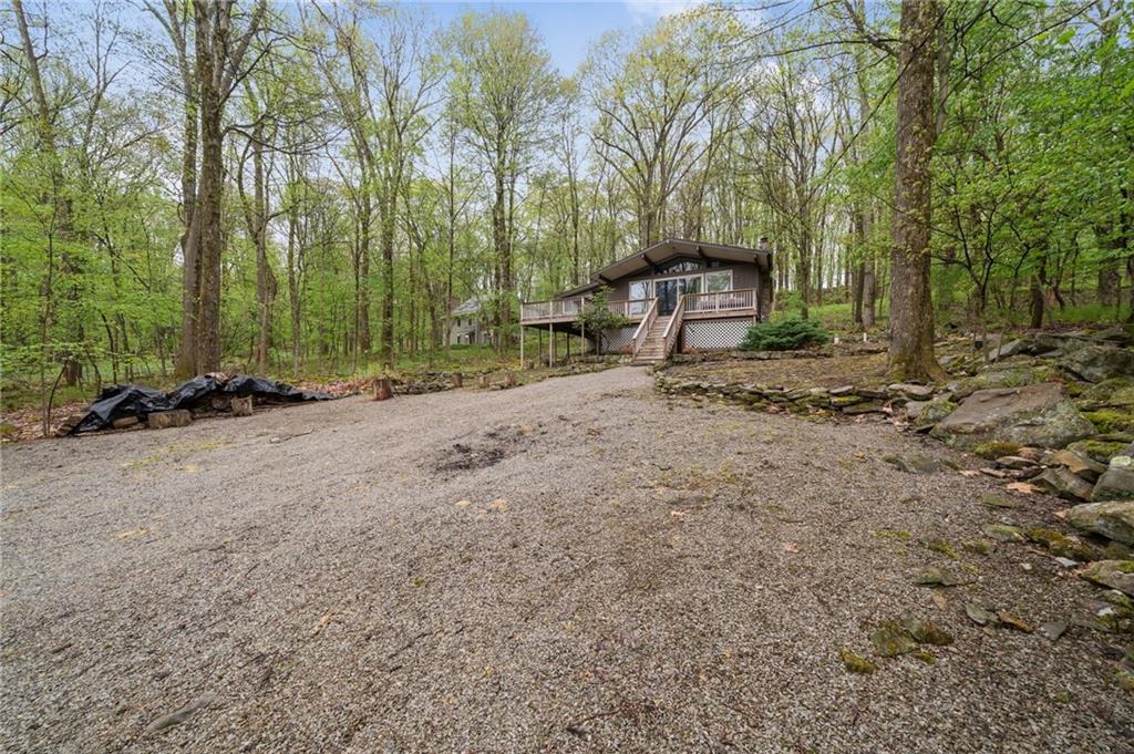 510 Forest Road Acme, PA 15610 - Photo 27 of 30 a backyard of a house with lots of green space
