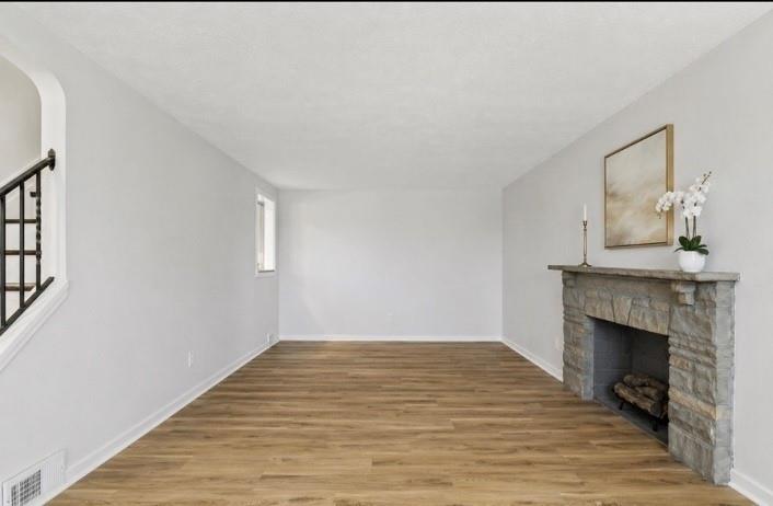 973 Agnew Road Pittsburgh, PA 15227 - Photo 7 of 46 Beautiful new flooring and neutral paint color give the room vibrancy.