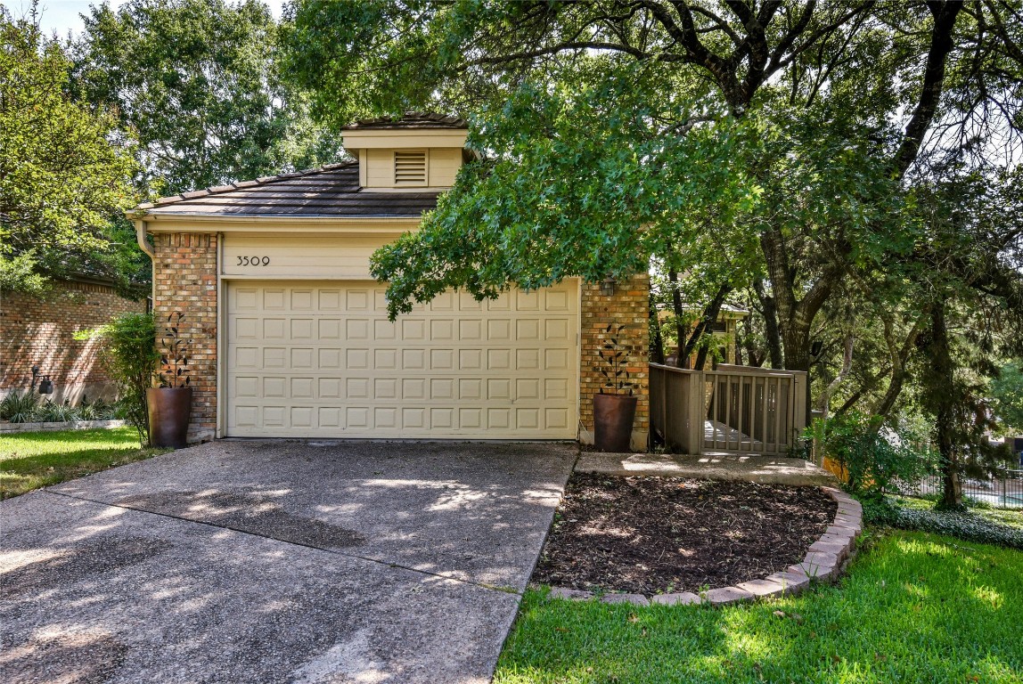3509 Fawn Trail Austin, TX 78746 - Photo 4 of 30 a view of a house with a yard