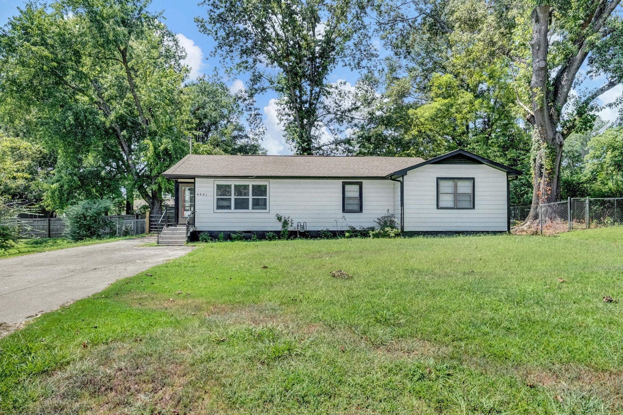 6681 Raleigh Millington Road Millington, TN 38053 - Photo 1 of 28 Single story home featuring view of scattered trees