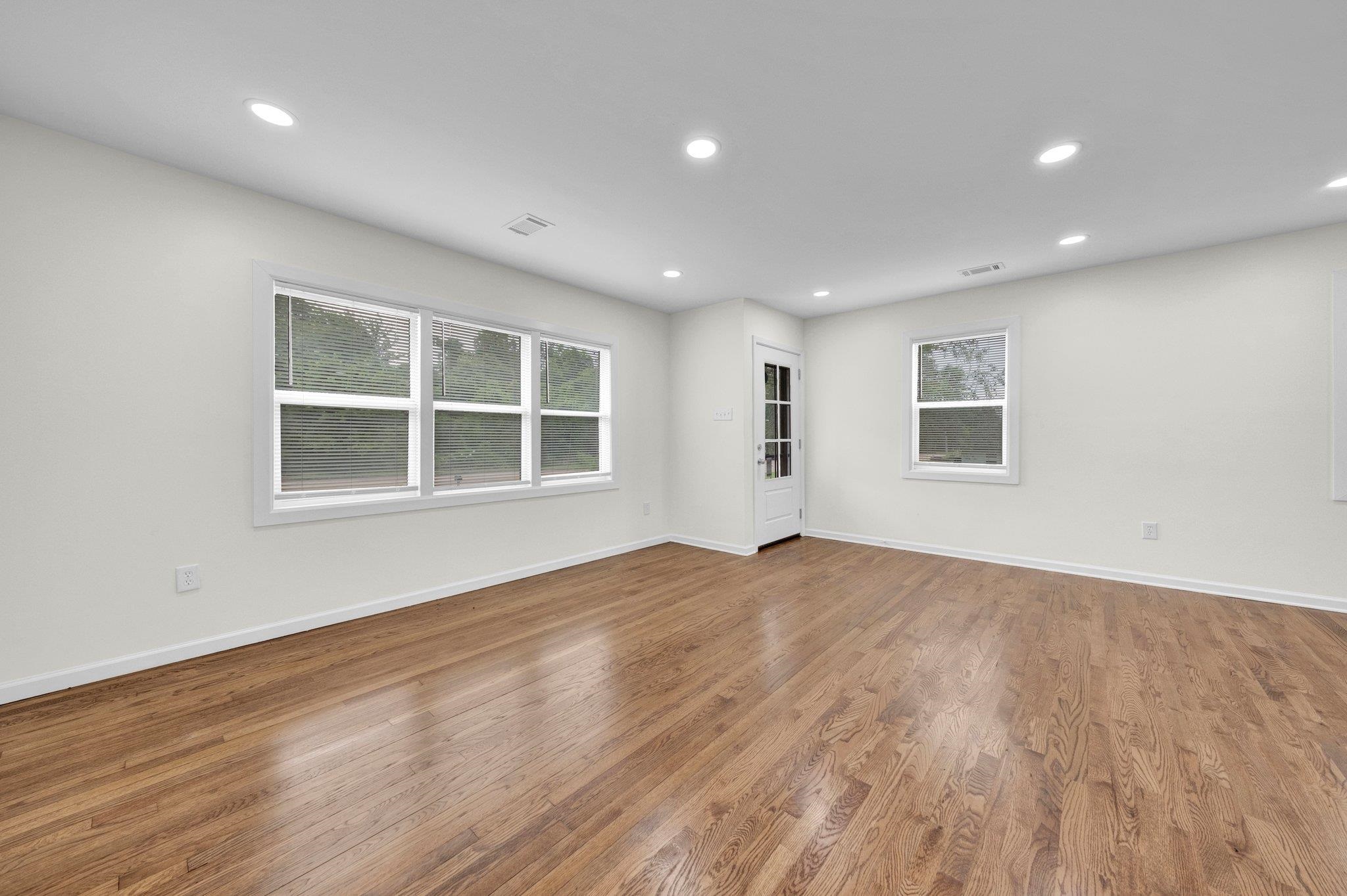 6681 Raleigh Millington Road Millington, TN 38053 - Photo 7 of 28 Spare room featuring plenty of natural light, wood finished floors, and recessed lighting